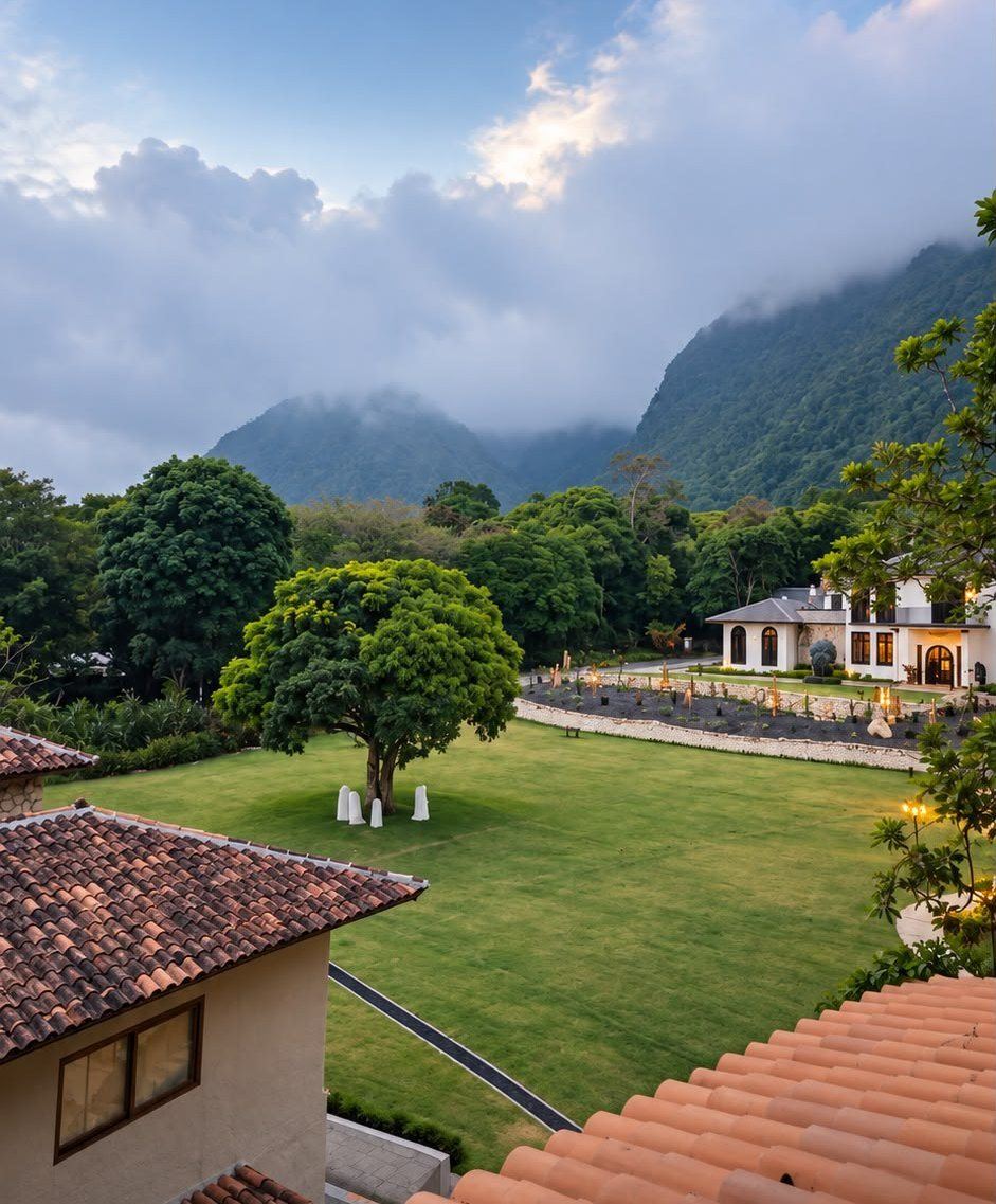 The hotel lawn and mountains of El Valle under a big sky